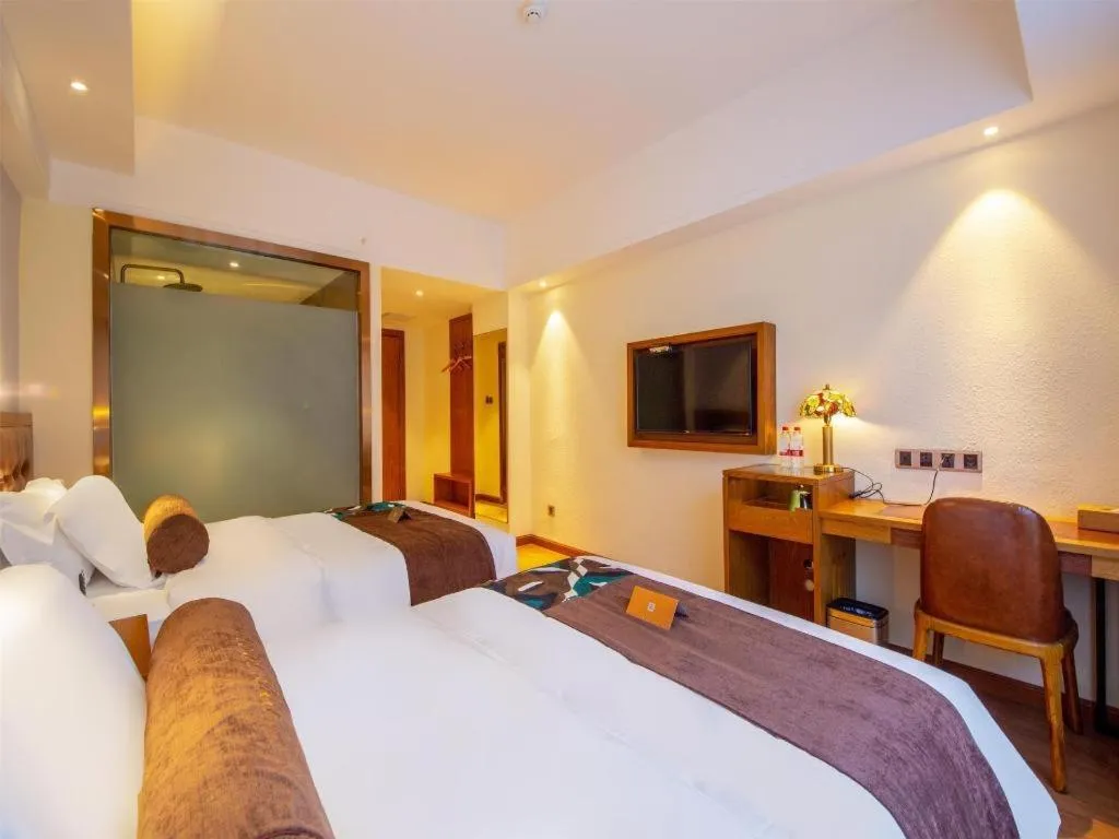 Bed in James Joyce Coffetel Kunming Railway Station Huancheng Nan Road Metro Station