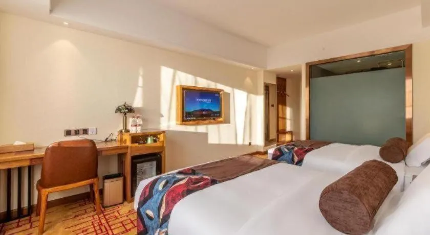 Bed in James Joyce Coffetel Kunming Railway Station Huancheng Nan Road Metro Station