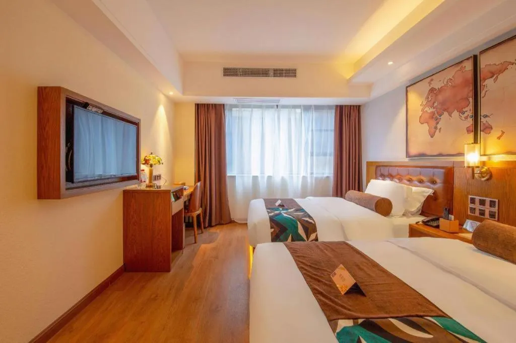 Bed in James Joyce Coffetel Kunming Railway Station Huancheng Nan Road Metro Station