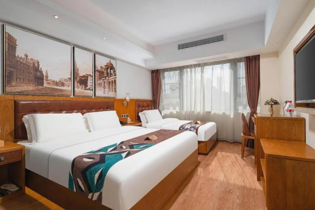 Bed in James Joyce Coffetel Kunming Railway Station Huancheng Nan Road Metro Station