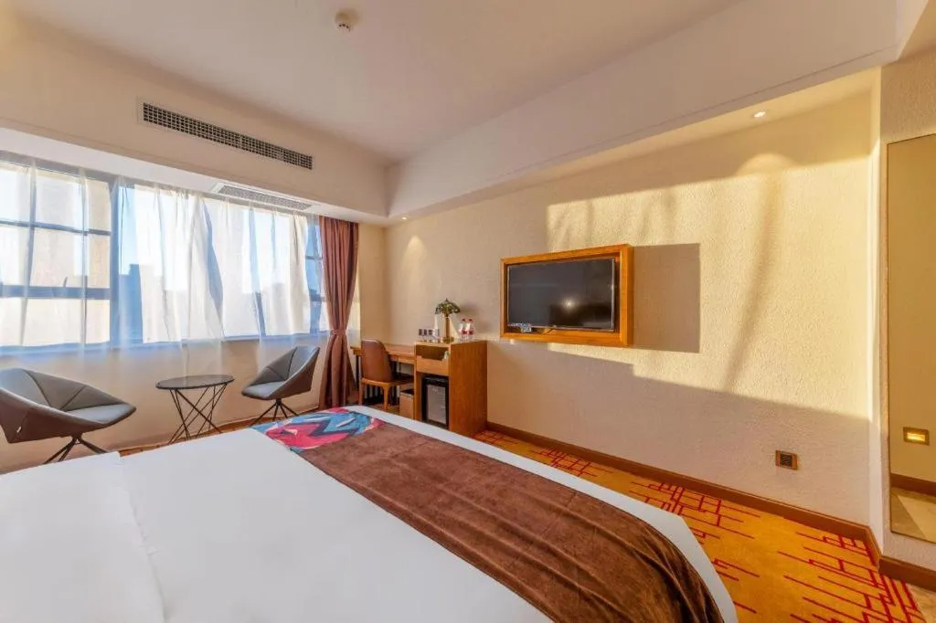 Bed in James Joyce Coffetel Kunming Railway Station Huancheng Nan Road Metro Station