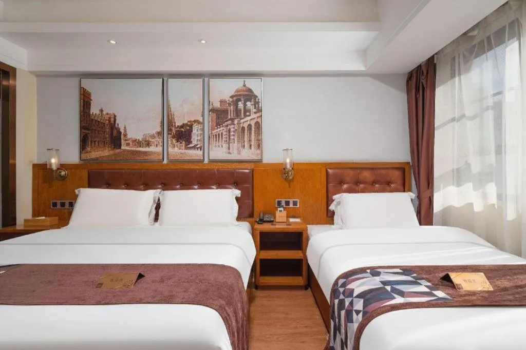 Bed in James Joyce Coffetel Kunming Railway Station Huancheng Nan Road Metro Station