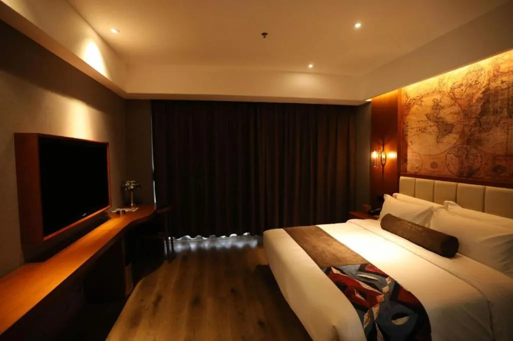 Bed in James Joyce Coffetel Xinyang Municipal Government Railway Station