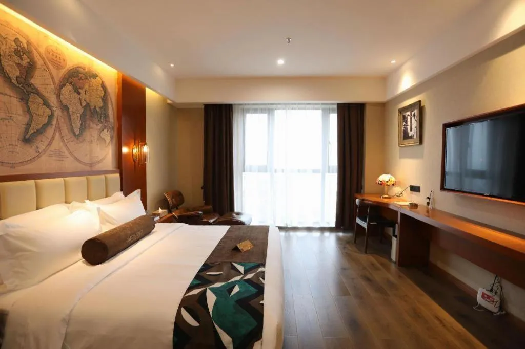 Bed in James Joyce Coffetel Xinyang Municipal Government Railway Station