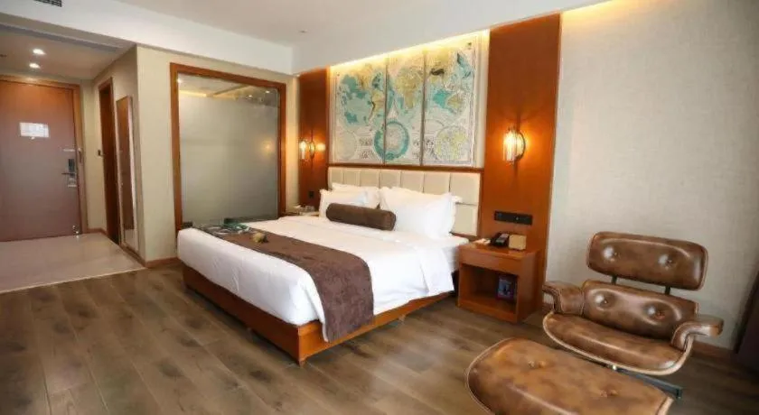 Bed in James Joyce Coffetel Xinyang Municipal Government Railway Station