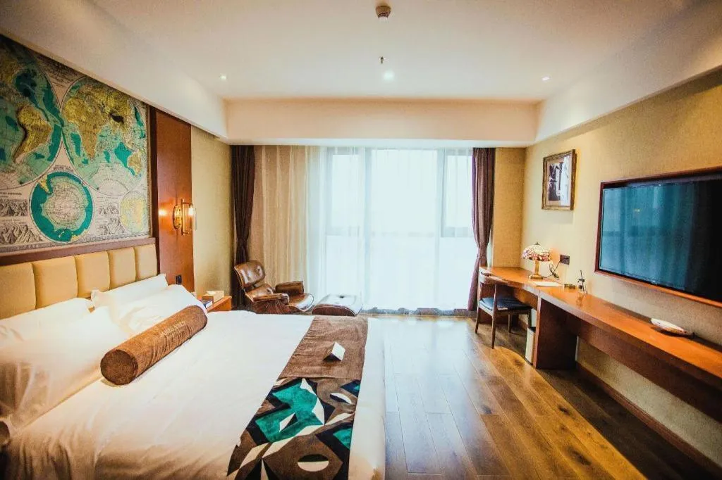 Bed in James Joyce Coffetel Xinyang Municipal Government Railway Station