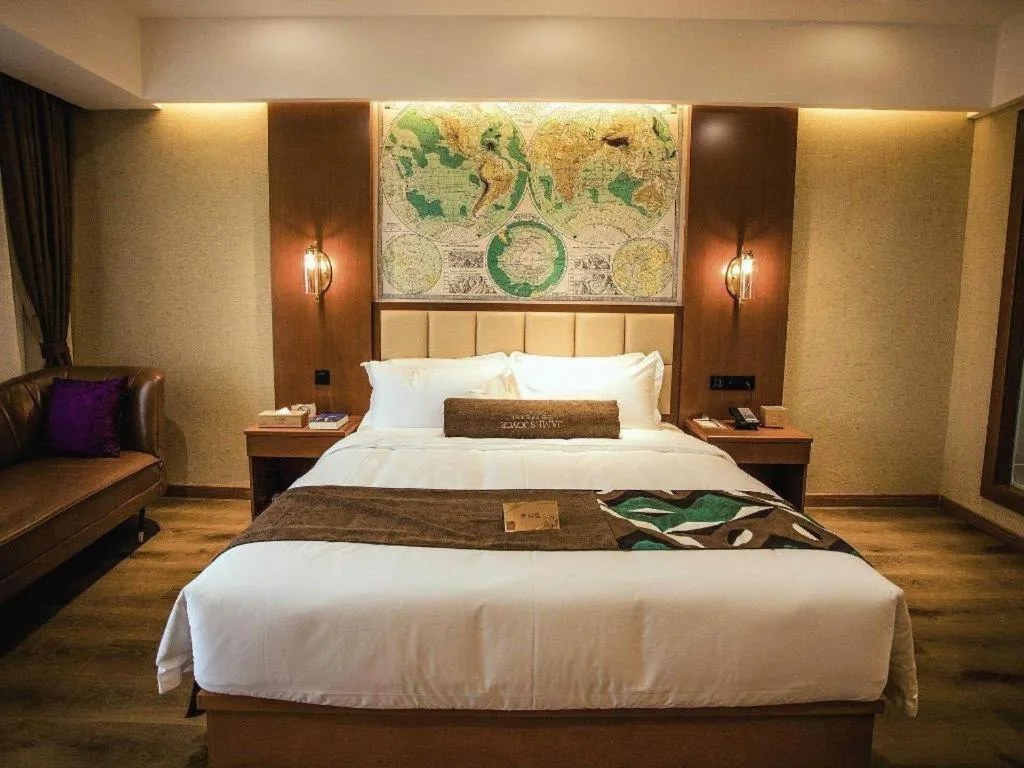 Bed in James Joyce Coffetel Xinyang Municipal Government Railway Station