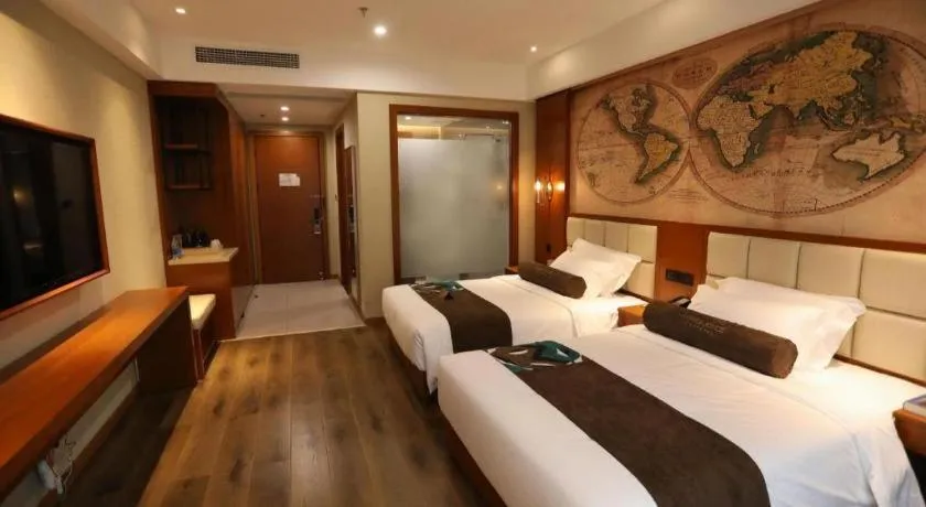 Bed in James Joyce Coffetel Xinyang Municipal Government Railway Station