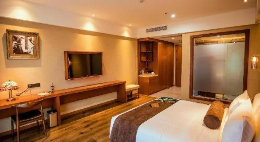 Bed in James Joyce Coffetel Xinyang Municipal Government Railway Station