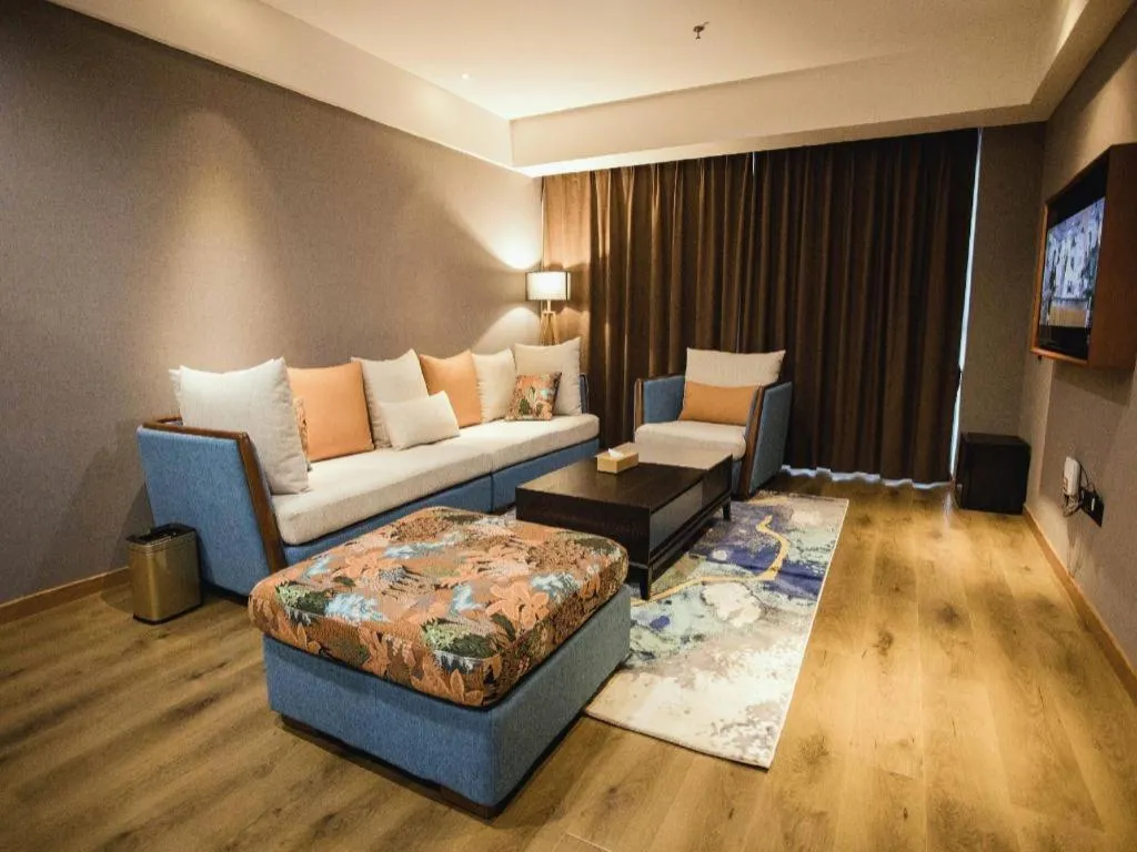 Bed in James Joyce Coffetel Xinyang Municipal Government Railway Station