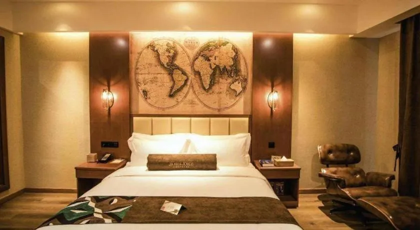 Bed in James Joyce Coffetel Xinyang Municipal Government Railway Station