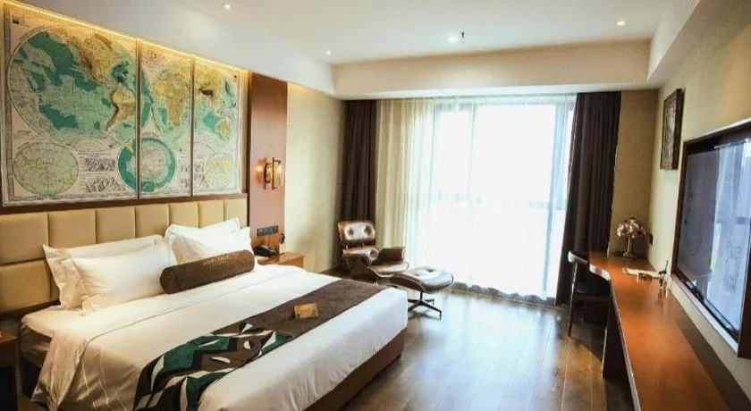 Bed in James Joyce Coffetel Xinyang Municipal Government Railway Station