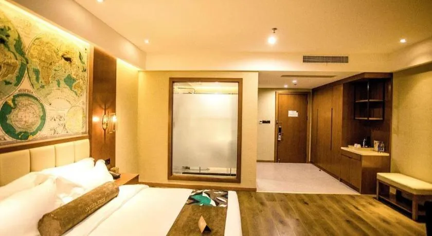 Bed in James Joyce Coffetel Xinyang Municipal Government Railway Station