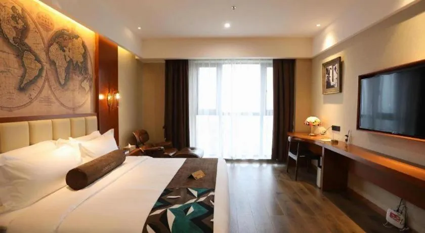 Bed in James Joyce Coffetel Xinyang Municipal Government Railway Station