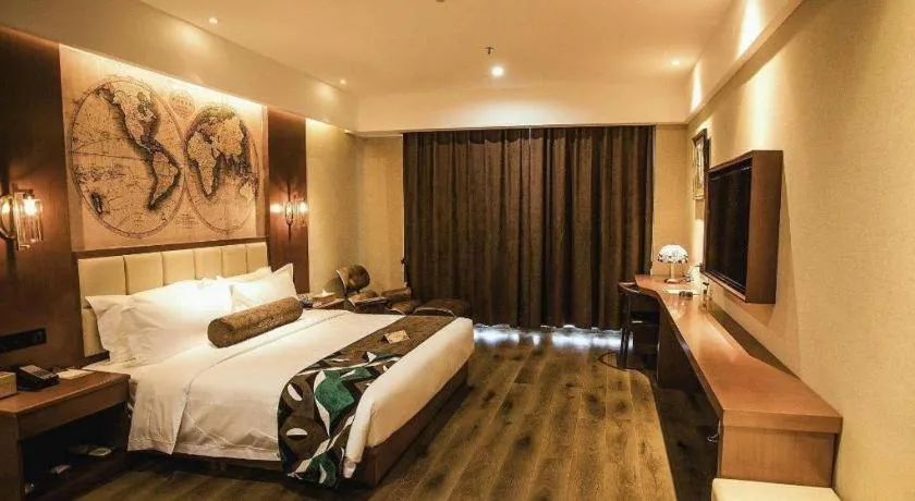 Bed in James Joyce Coffetel Xinyang Municipal Government Railway Station