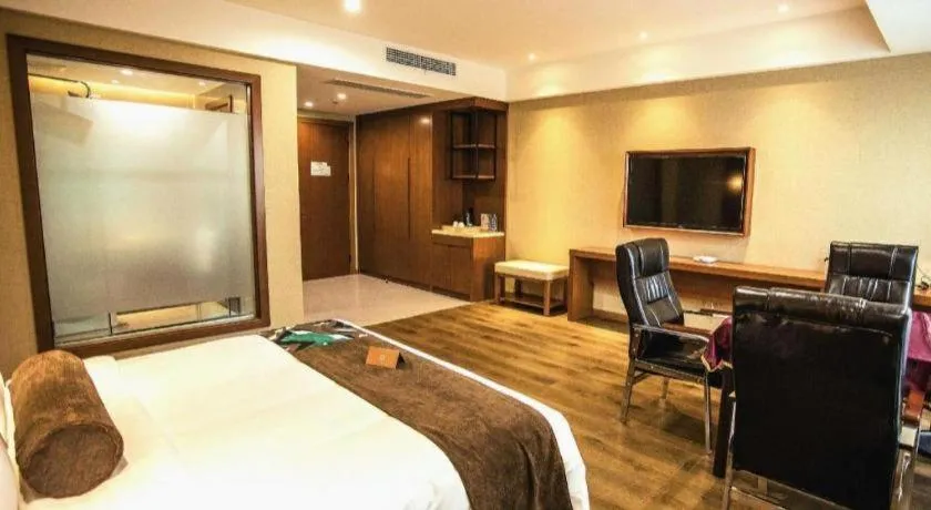 Bed in James Joyce Coffetel Xinyang Municipal Government Railway Station