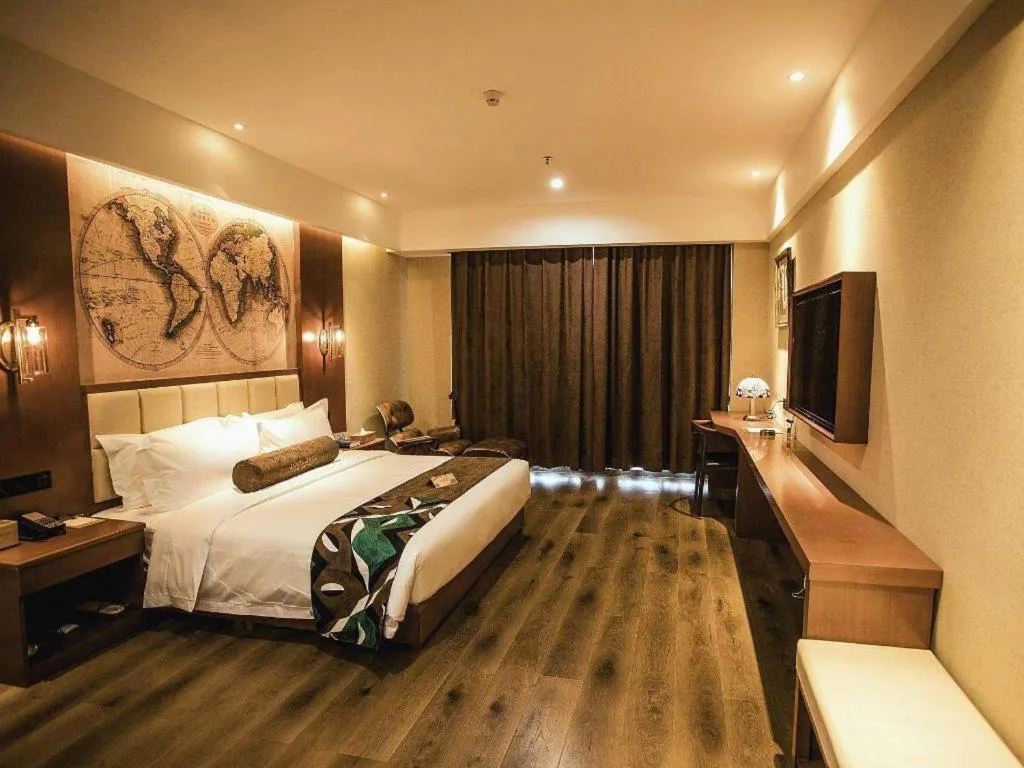 Bed in James Joyce Coffetel Xinyang Municipal Government Railway Station