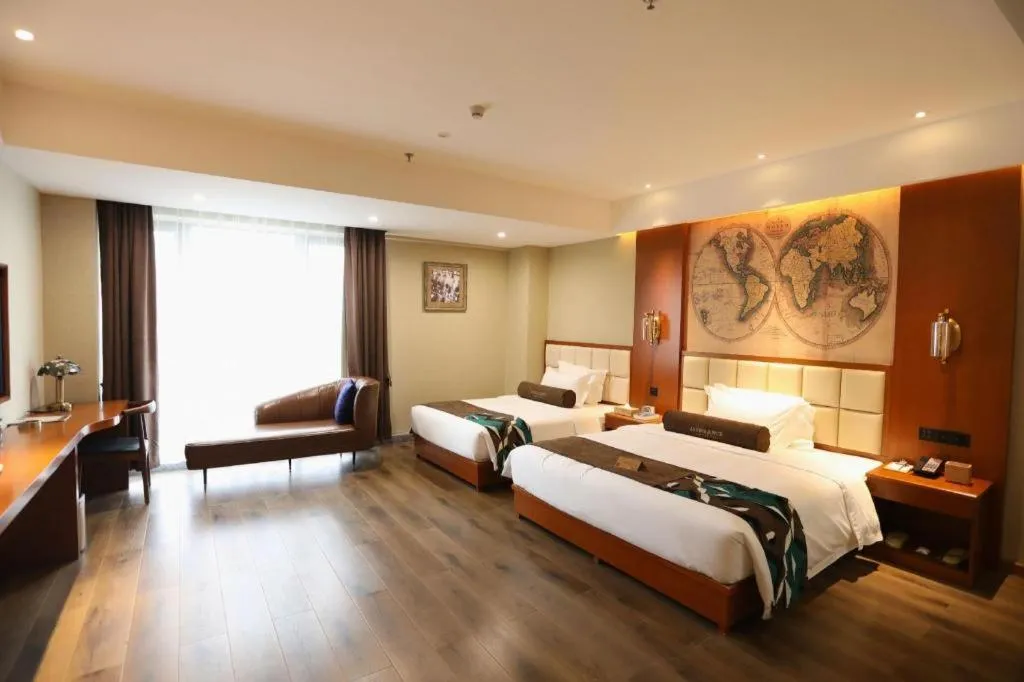 Bed in James Joyce Coffetel Xinyang Municipal Government Railway Station