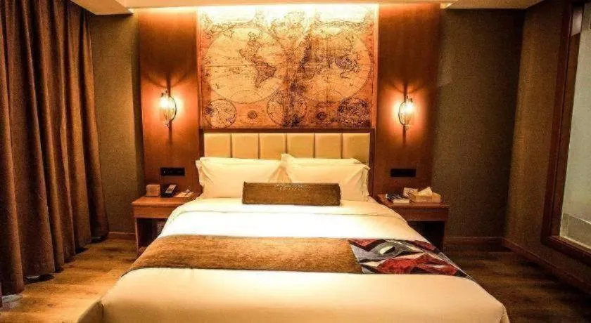 Bed in James Joyce Coffetel Xinyang Municipal Government Railway Station