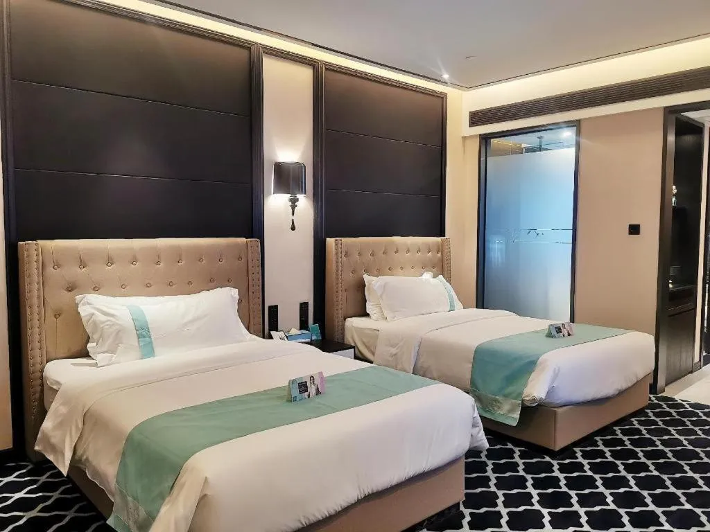 Bed in Xana Hotelle Guangzhou Luogang Science City Huangpi Metro Station