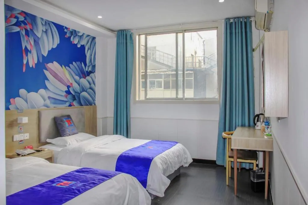 Bed in Pai Hotel Xuzhou Railway Station