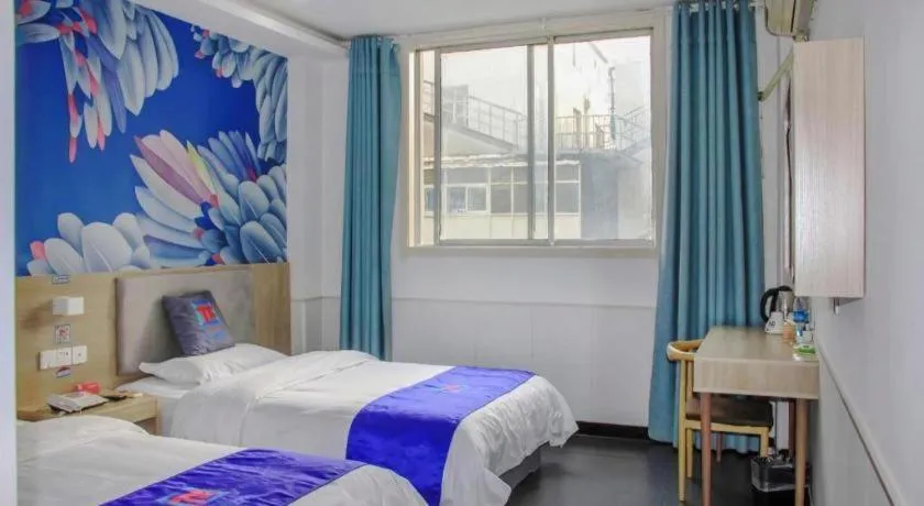 Bed in Pai Hotel Xuzhou Railway Station