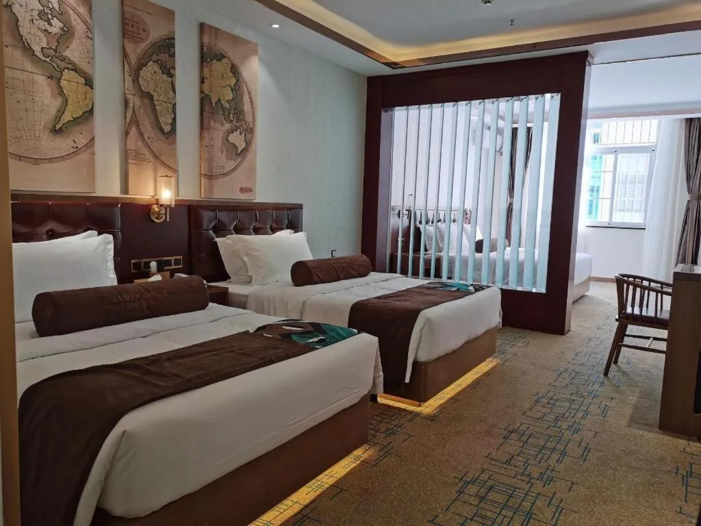 Bed in James Joyce Coffetel Lijiang Ancient City Dashuiche