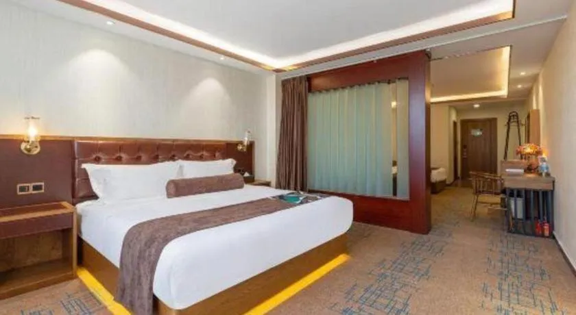 Bed in James Joyce Coffetel Lijiang Ancient City Dashuiche