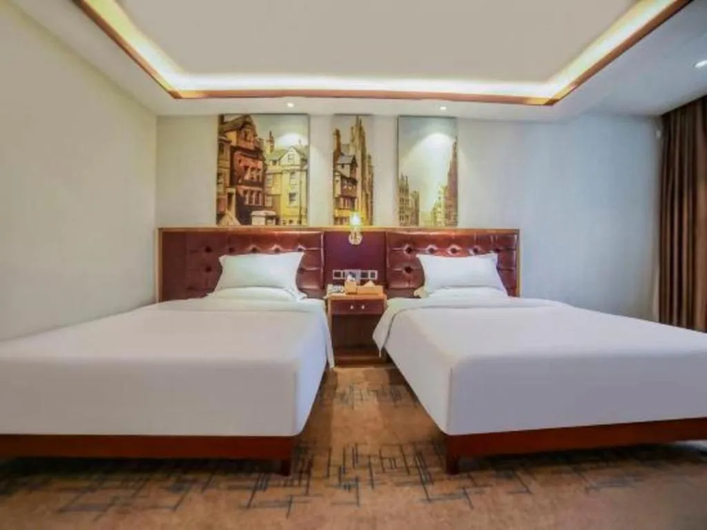 Bed in James Joyce Coffetel Lijiang Ancient City Dashuiche