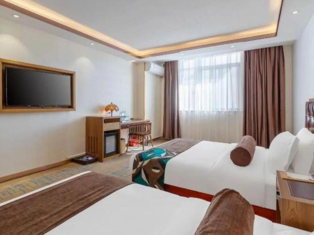 Bed in James Joyce Coffetel Lijiang Ancient City Dashuiche