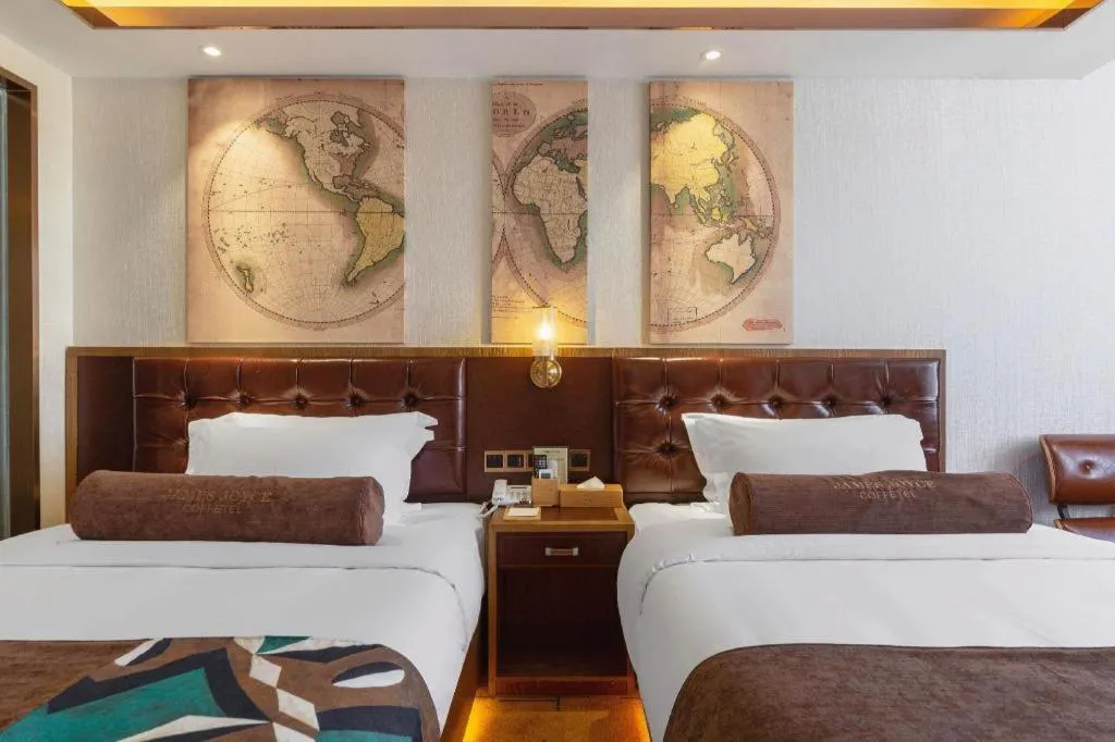 Bed in James Joyce Coffetel Lijiang Ancient City Dashuiche