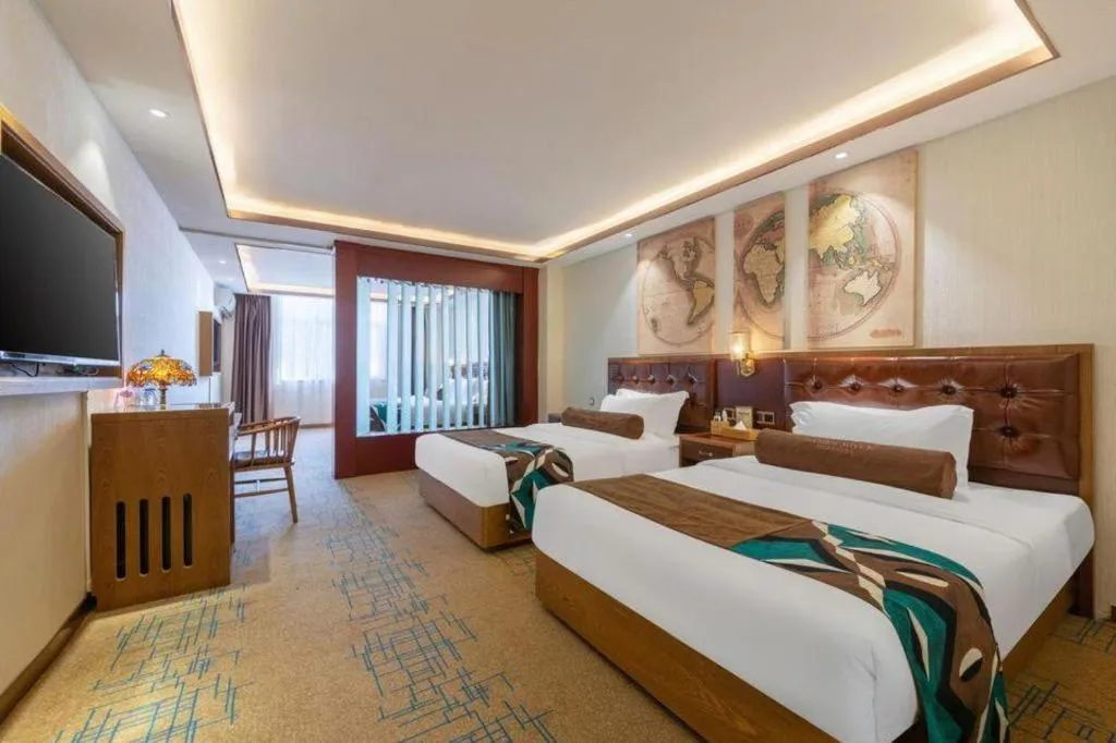 Bed in James Joyce Coffetel Lijiang Ancient City Dashuiche