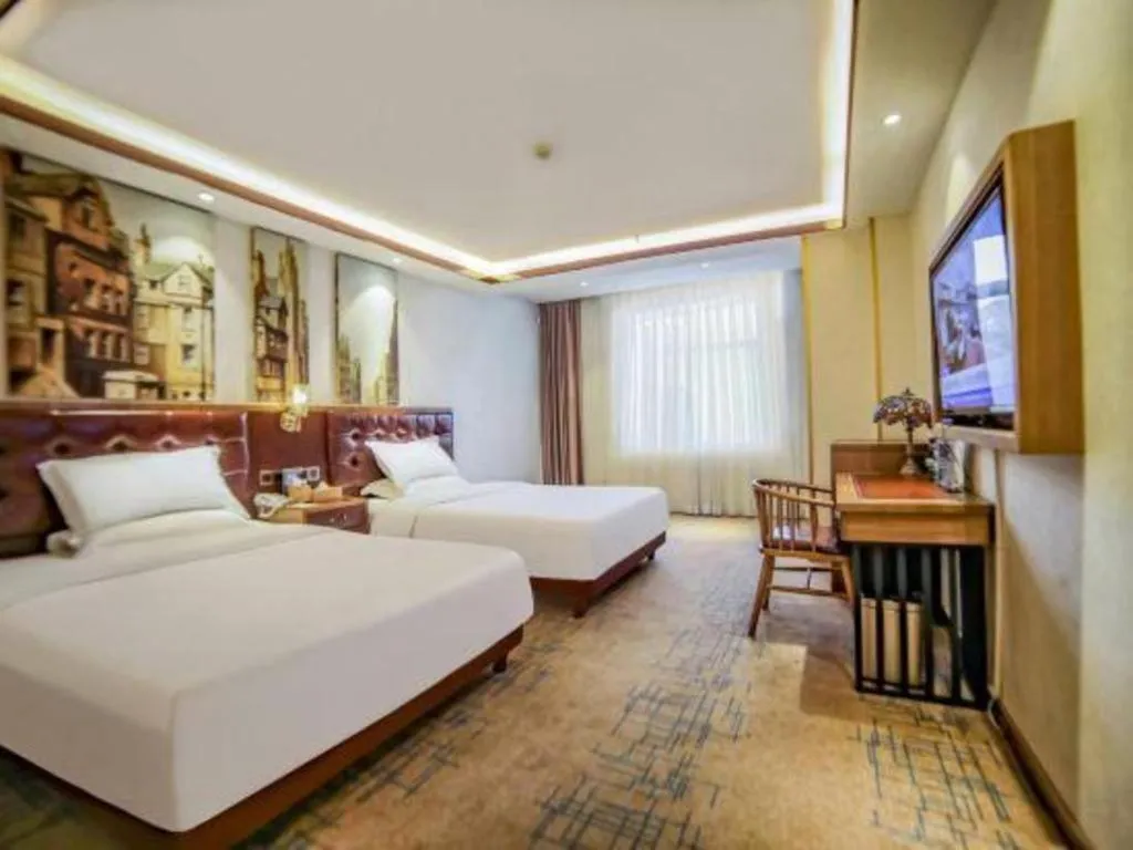 Bed in James Joyce Coffetel Lijiang Ancient City Dashuiche