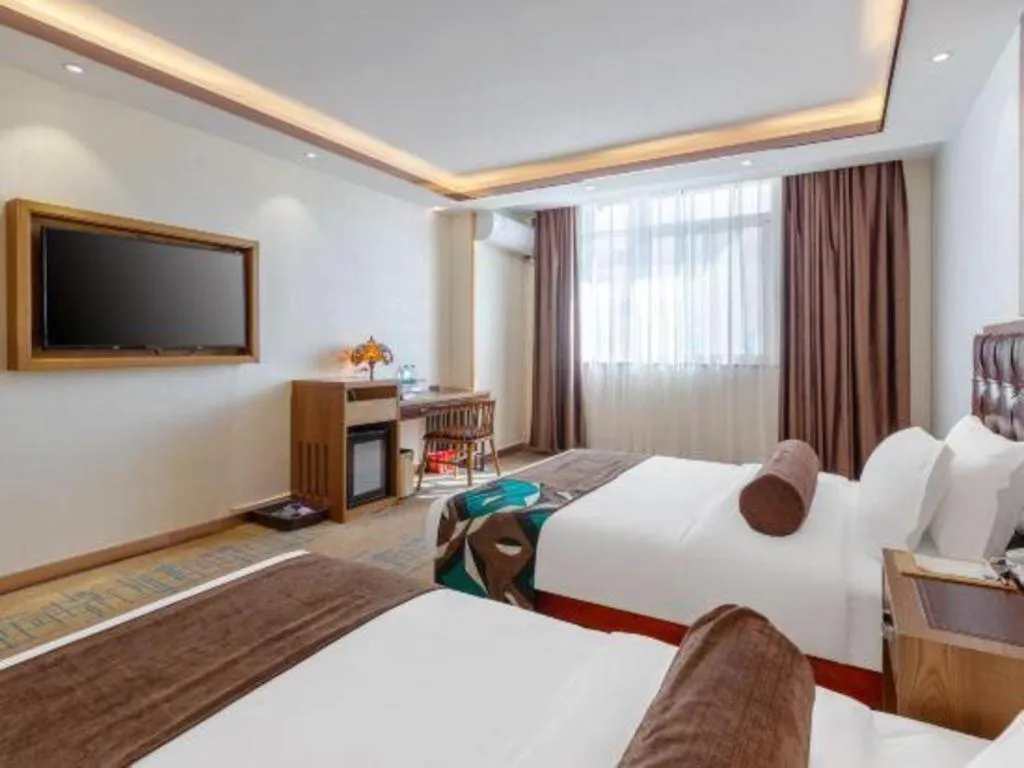 Bed in James Joyce Coffetel Lijiang Ancient City Dashuiche