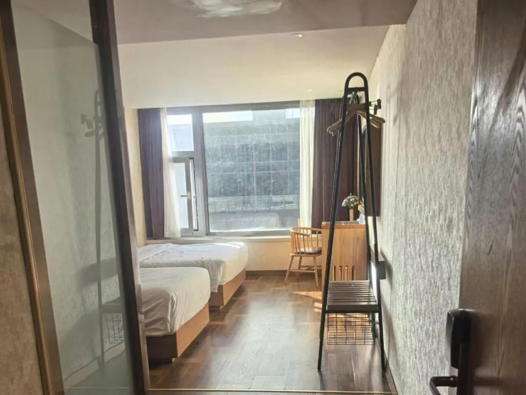 Bed in James Joyce Coffetel Beijing Tongzhou Guoyuan Metro Station