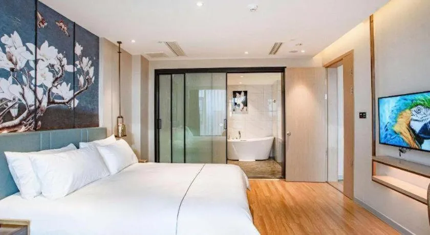 Bed in Magnotel Hotel Guangyuan Nanhe Bus Station Beijing Road