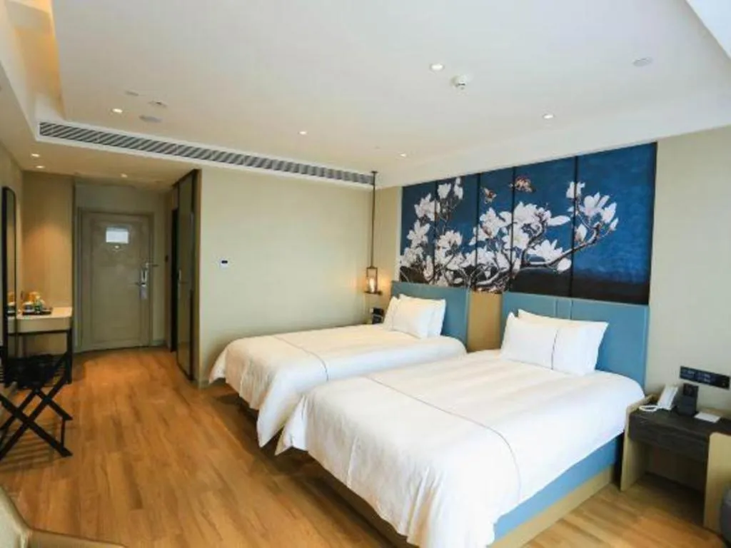 Bed in Magnotel Hotel Guangyuan Nanhe Bus Station Beijing Road