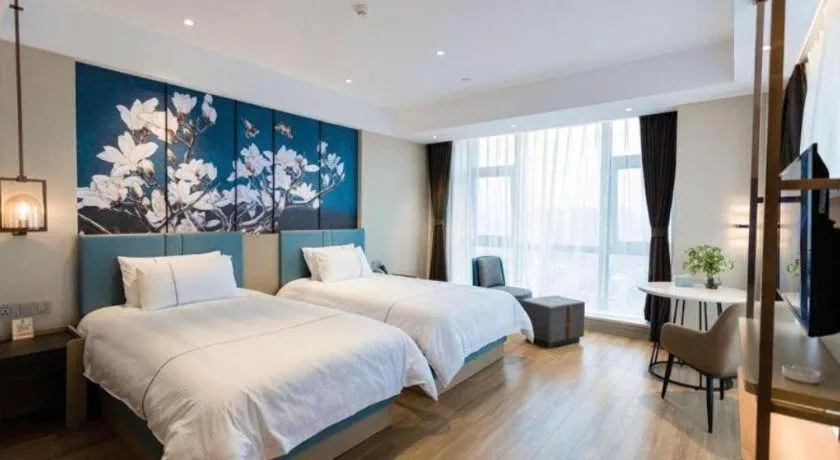 Bed in Magnotel Hotel Guangyuan Nanhe Bus Station Beijing Road