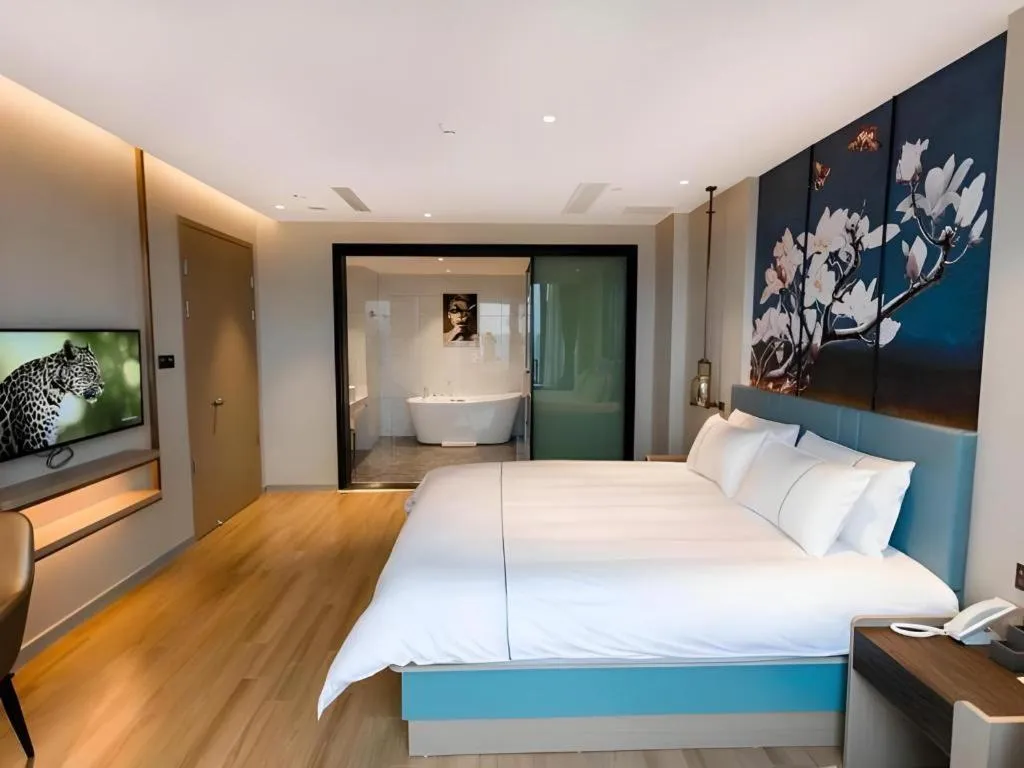 Bed in Magnotel Hotel Guangyuan Nanhe Bus Station Beijing Road