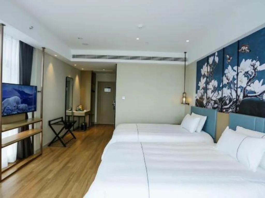 Bed in Magnotel Hotel Guangyuan Nanhe Bus Station Beijing Road