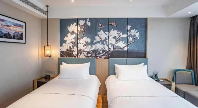 Bed in Magnotel Hotel Guangyuan Nanhe Bus Station Beijing Road