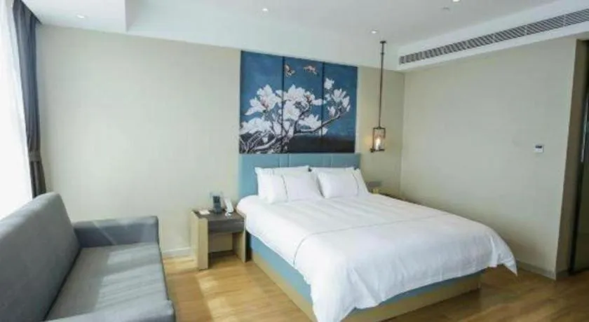 Bed in Magnotel Hotel Guangyuan Nanhe Bus Station Beijing Road