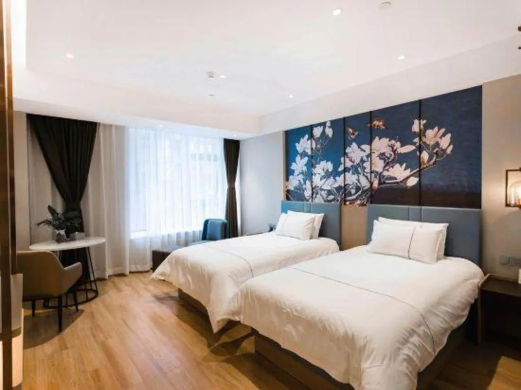 Bed in Magnotel Hotel Guangyuan Nanhe Bus Station Beijing Road