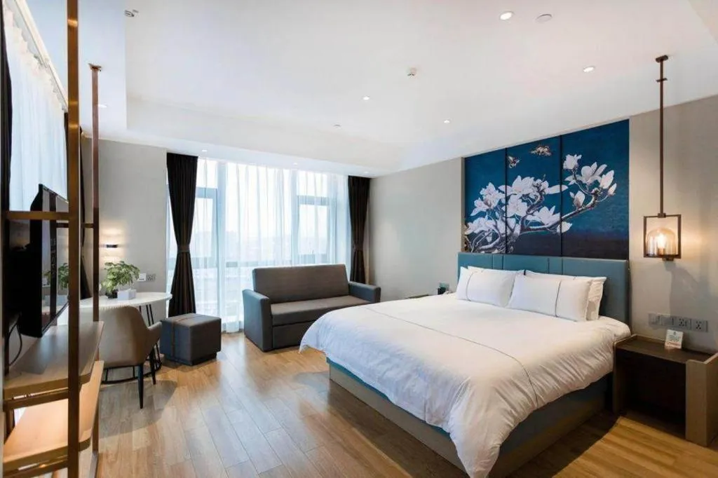 Bed in Magnotel Hotel Guangyuan Nanhe Bus Station Beijing Road