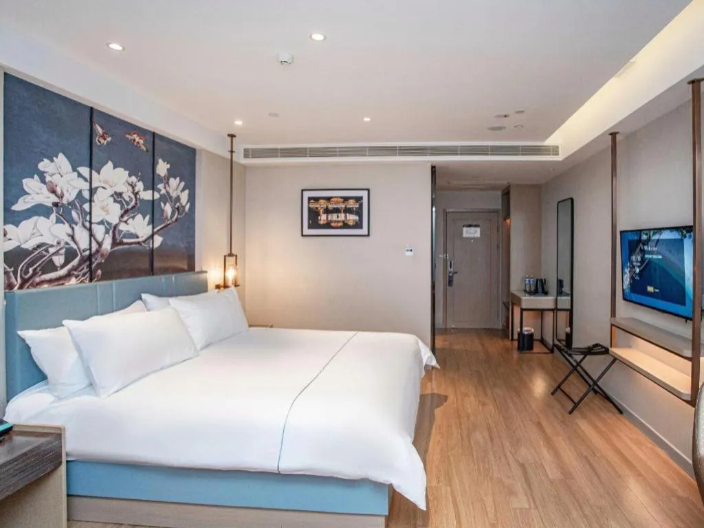 Bed in Magnotel Hotel Guangyuan Nanhe Bus Station Beijing Road