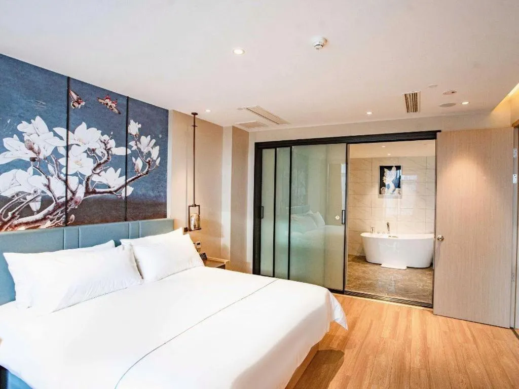 Bed in Magnotel Hotel Guangyuan Nanhe Bus Station Beijing Road