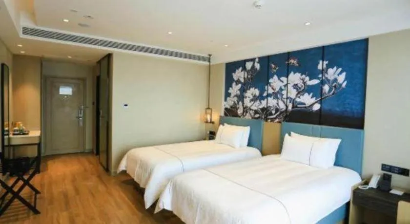 Bed in Magnotel Hotel Guangyuan Nanhe Bus Station Beijing Road