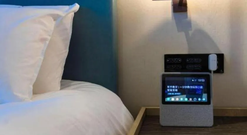 Bed in Magnotel Hotel Guangyuan Nanhe Bus Station Beijing Road