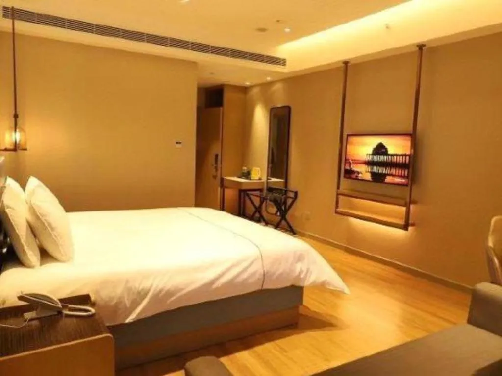 Bed in Magnotel Hotel Guangyuan Nanhe Bus Station Beijing Road