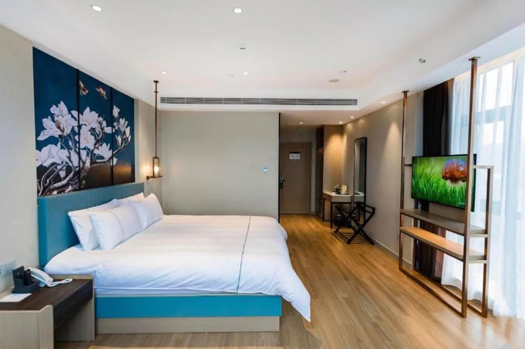 Bed in Magnotel Hotel Guangyuan Nanhe Bus Station Beijing Road